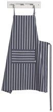 Load image into Gallery viewer, Now Designs 'Butcher Stripe' Mighty Apron is longer and wider than standard chef aprons for extended coverage. 100% cotton with adjustable neck strap and long ties. Machine wash and dry.