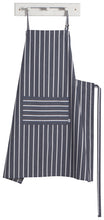 Load image into Gallery viewer, Now Designs &#39;Butcher Stripe&#39; Mighty Apron is longer and wider than standard chef aprons for extended coverage. 100% cotton with adjustable neck strap and long ties. Machine wash and dry.
