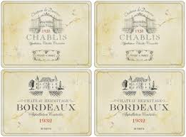 Pimpernel Vin De France set of 4 placemats. Cork backed laminated hardboard. Easy clean. 2 chablis and 2 bordeaux prints in each set. Gift packaged.