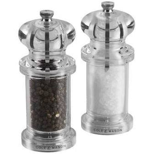 Classically styled salt and pepper mills in acrylic by Cole & Mason. 13.5 cm tall. Salt and pepper included, gift boxed. 